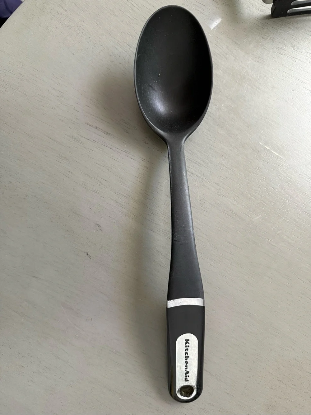 KitchenAid Black Nylon Cooking Spoon with Silver Accent